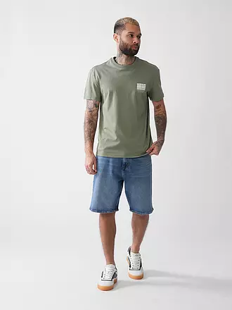TOMMY JEANS | Nombre del producto: Camiseta
Marca: TOMMY JEANS
Color: olive
Categorías: Moda,Hombre

Largo de manga: Manga corta
Escote: Cuello redondo
Material: Jersey,Algodón
Diseño: Logo,Estampado
Corte (Prenda superior): Regular
Estilo: Young Fashion | olive